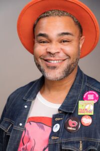 Headshot of Heard teaching artist C. Thomas.